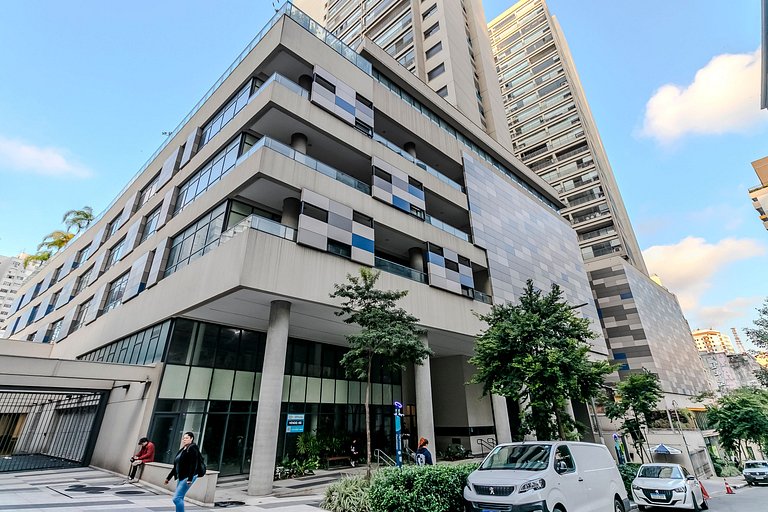 Studio com coworking, piscina e vista da cidade