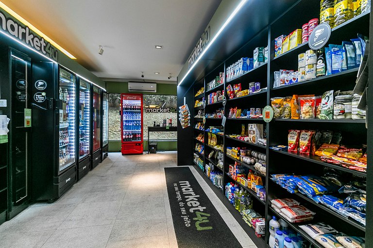 Studio com coworking, piscina e vista da cidade