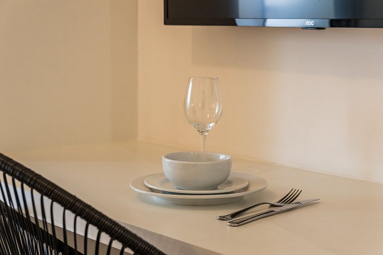 Studio com coworking, piscina e vista da cidade