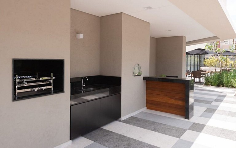 Studio com coworking, piscina e vista da cidade