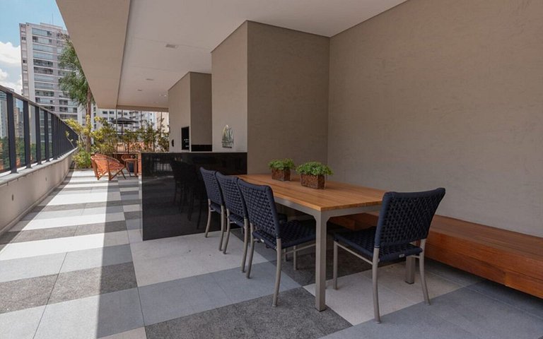 Studio com coworking, piscina e vista da cidade