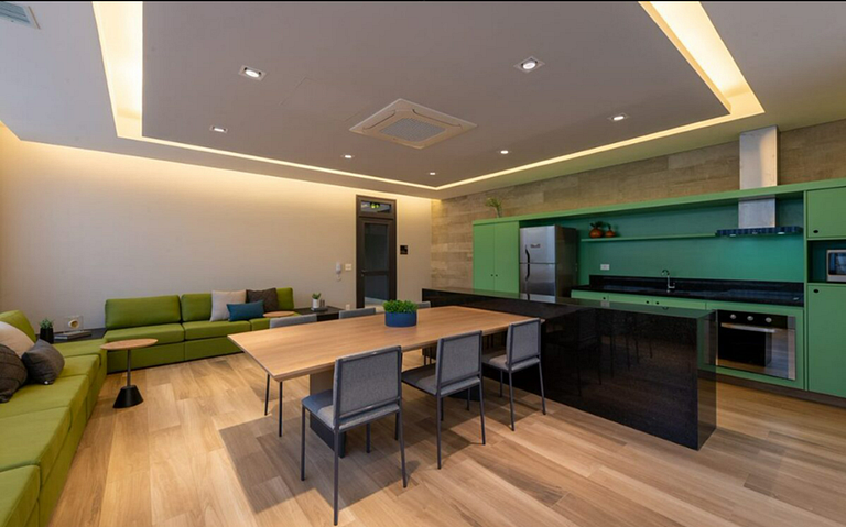 Studio com coworking, piscina e vista da cidade