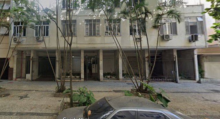 Side sea view, quiet tree-lined street